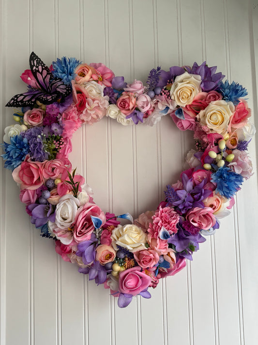 Floral love heart wicker wreath.